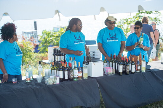 Event staff and wine at Baltimore Seafood Festival. Photo Credit: David McIntosh Photographics