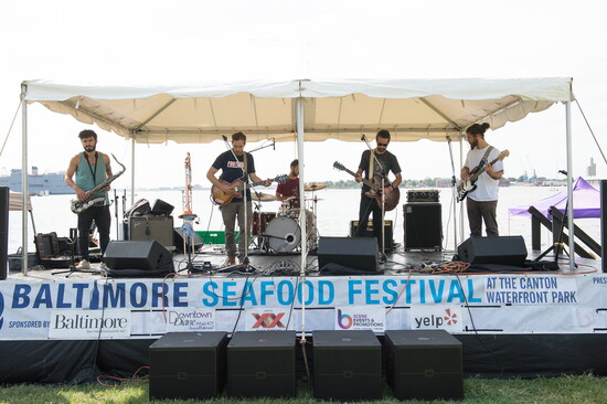 A band playing at Baltimore Seafood Festival. Photo Credit: Dave McIntosh Photographics