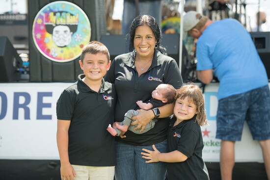 Beth Laverick with three of her children. Photo Credit: Dave McIntosh Photographics. 