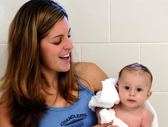 Cherie holding Corey as a baby, her reason “why.”