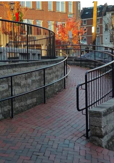 Curved ramp from Hanover Garage to the Gaslight patio. Photo by Anne Weidman