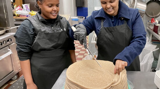Niyat and her mom, Letensae making Injera (Sourdough Flatbread)
