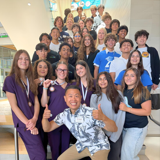 Mike SooHoo with RUHS entrepreneurship students at Project ECHO’s High School Entrepreneurs’ Business Plan Competition.