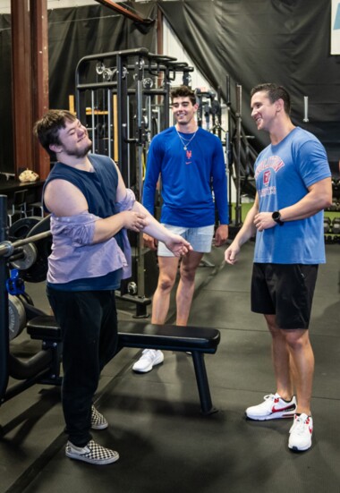 AJ Sanders gets ready to work out with NY Mets pitcher Zach Thornton and EA owner Tyler Naylor