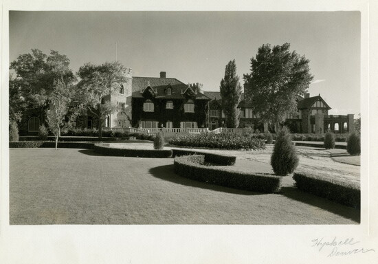 Historic photo showing both the Gothic renovation and Tudor facade