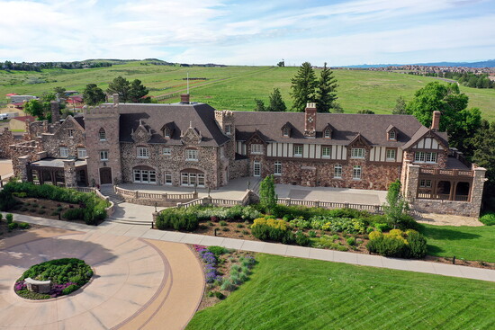 The mansion today - from left to right, original farmhouse, Gothic Revival, Tudor facade