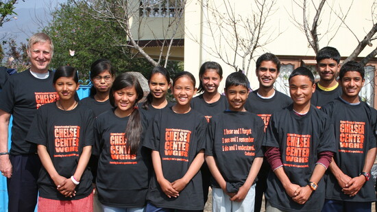 Glenn Detrick and kids at an orphan's home in Nepal.