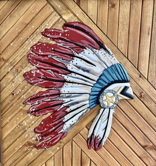 Navajo Artist and New Mexico resident Tara Largo uses intarsia woodworking, a form of woodworking where pieces of wood are carefully fitted together like a puzz