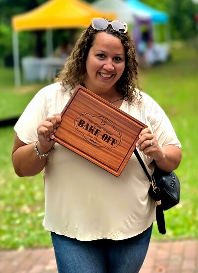 Jane holding 1st Place Award in Ridley Park's Victorian Festival Bake Off