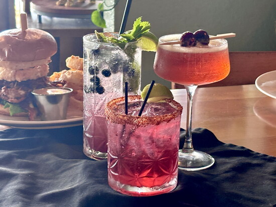 Guests of the new Osprey location can enjoy a full bar with inventive cocktails a la Five Nine!