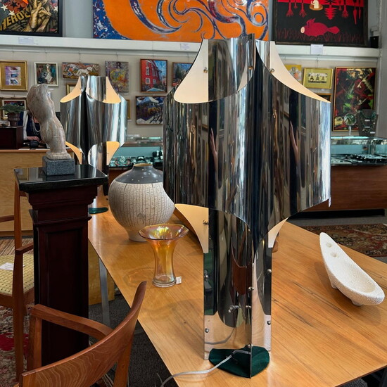 Chrome "Cathedral" lamps by Robert Sonneman.
