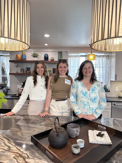 Our Sales Director Emily Labdon and Publication Director Carly Mac Manus with the Owner of the Wildfair Home