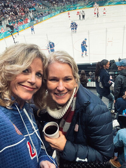 Tara and pal Chantal Tkachuk catching a USA Men's hockey game.
