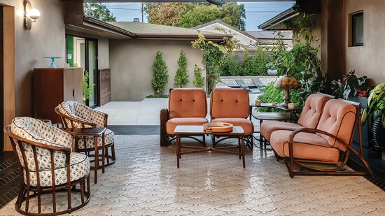 A rendering of an outdoor patio designed by Melissa for a client.