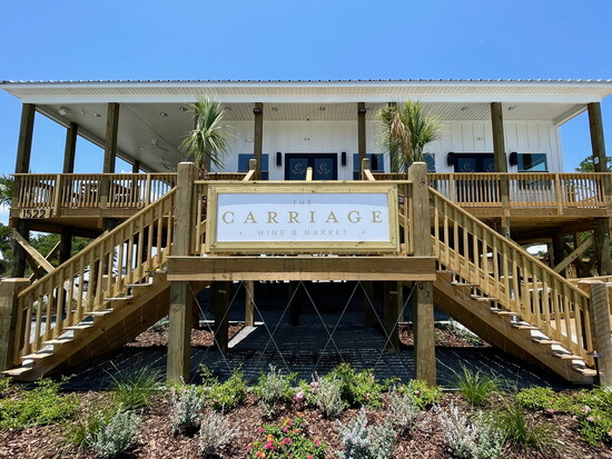 The Carriage House offers a full bar, a bistro-style menu, and a large selection of retail wines. (Photo: The Carriage House Wine & Market: Dauphin Island)