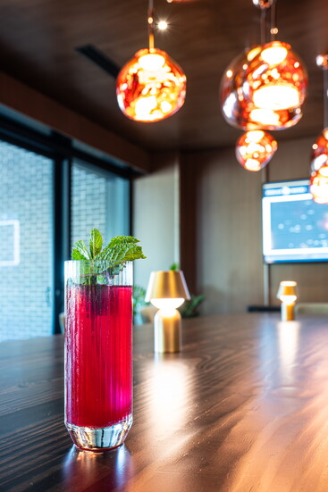 The blueberry mojito uses centrifuged blueberry syrup for rich flavor without adding heat.