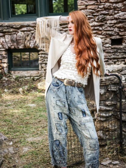 Alysa Rene- Jacket with fringe, matte sequin top, patchwork denim jeans, earrings and necklace