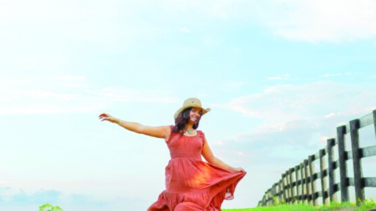 Easy to accessorize rust midi dress paired with turquoise jewelry. (Beyond Bijoux)