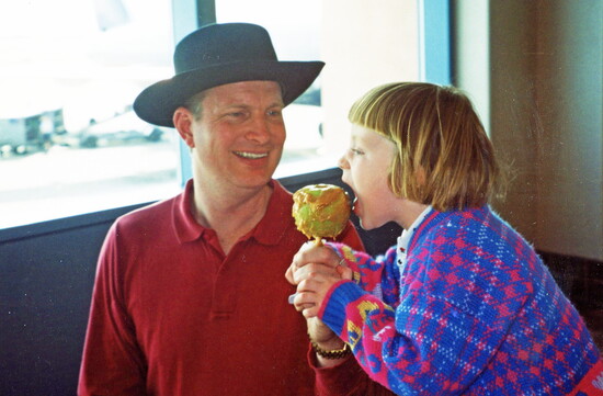 Kearney Thompson enjoys a caramel apple