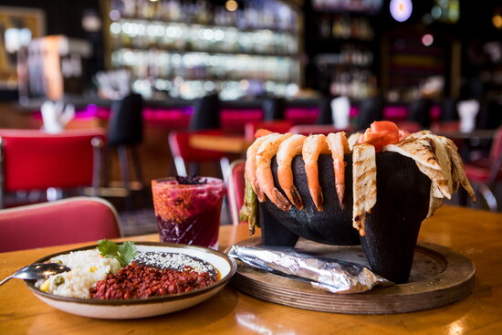 Enjoy molcajete el monstruo, a customer favorite.