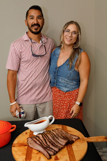 Steven and Mary with Lonestar Air Services and their brisket
