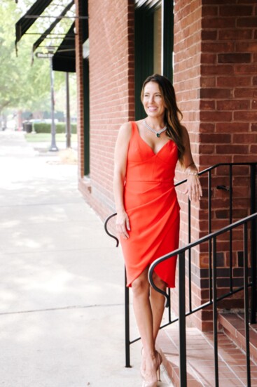 Dr. Beki Kellogg models a fall favorite color, a rich citrine jeweled orange dress-DIVINE!