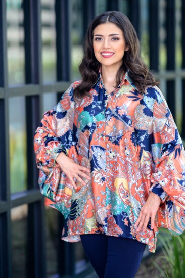 Transition into fall with this brightly colored hi-low paisley blouse with fabulous dolman sleeves. The BLVD.