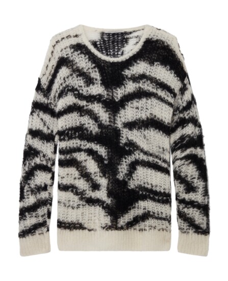 Stella McCartney’s cozy, slouchy Tiger Pattern Open-Knit Sweater is spun from RAS-certified wool in an oversized silhouette. Stellamccartney.com.