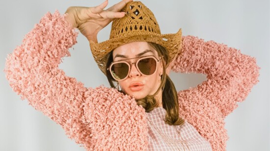 Cowboy Hat from Shop Chicks. Sunglasses, Necklace, Shag Cardigan, Crochet Purse, Prairie Plaid Dress from The Stash. 