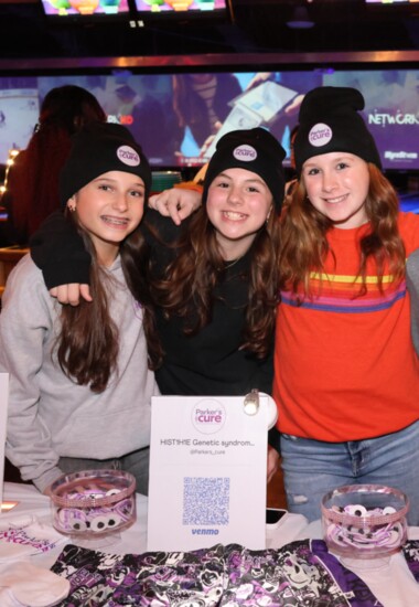 Merch table at the 2024 Parker's Cure event, with their Junior Board President Remi Rutstein, at left. Photo by Allison Ginsburg