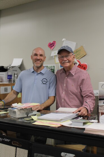 Luke Merriam, owner of Glover & Flack's Flooring Warehouse, works with his father-in-law, John Flack. 