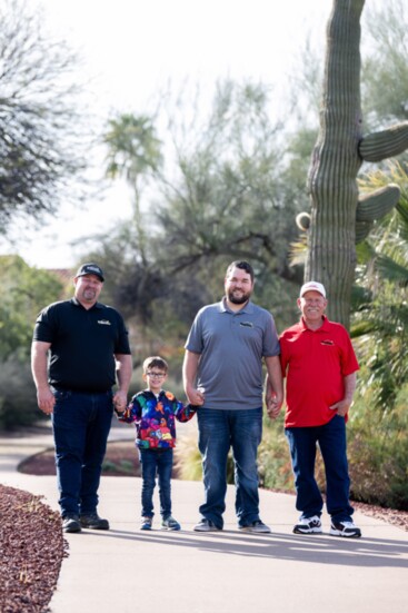 (L to R) Nathan Spencer with grandson August, son Chris, and father John