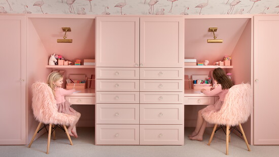 This girls ’ bedroom designed by Williams House is perfectly pretty in pink.