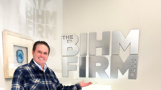 Kevin Bratton enjoys the Bihm Firm's comfy lounge.