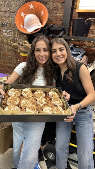 Carly and Madison with the legendary blueberry pancake cinnamon rolls.