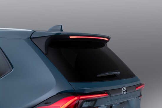 Foot-activated power liftgate with a rear spoiler