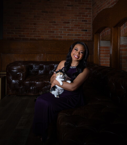 WDIV-TV 4 Reporter Shawnte Passmore with Versace from Happy Paws Haven