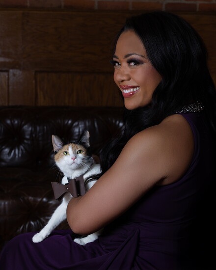 WDIV-TV 4 Reporter Shawnte Passmore with Versace from Happy Paws Haven