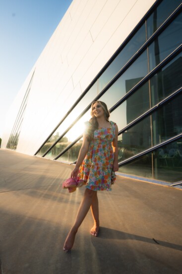 Clare looks stunning in a Floral Dreams ruffle trim tiered mini-dress ($48). 