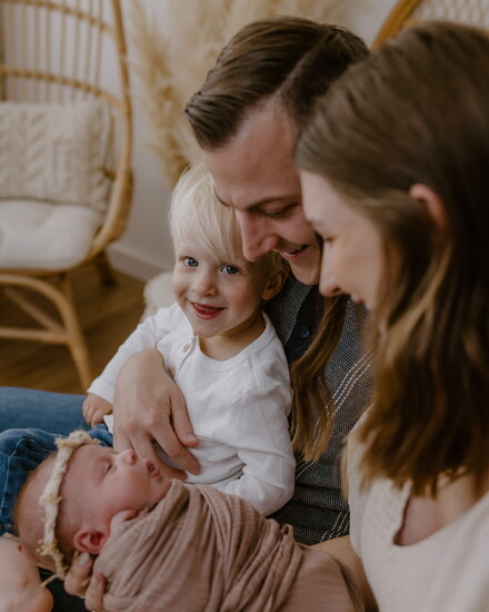 James with his wife and children