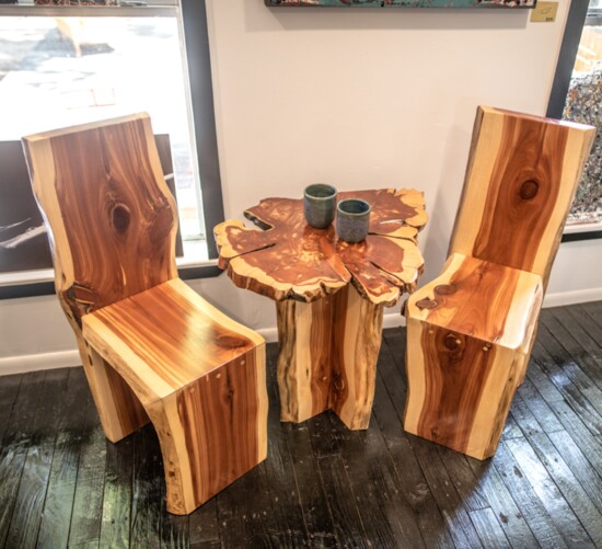 A custom table and chairs on the floor at 209th Designs