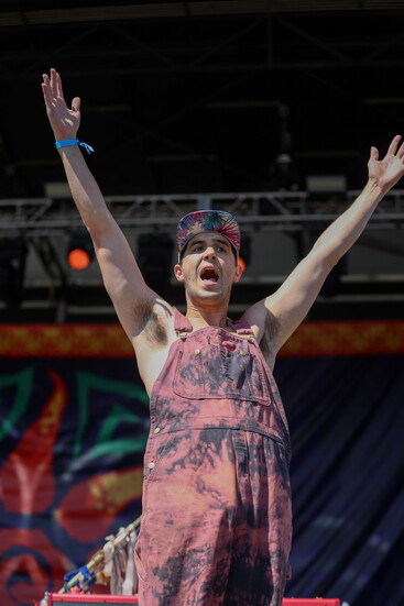 Danny Bauer lights up a festival stage as keyboardist + vocalist with Chicago jam-funk band Sneezy. 