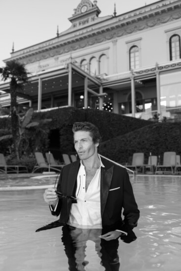 Markoff at the Grand Hotel Villa Serbollini in Lake Como, Italy, wearing a custom Sartoro tux (Credit: Lilly Red)