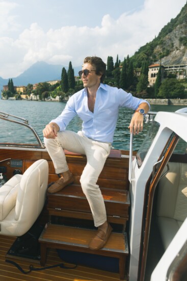 Setting sail on Lake Como in Italy (Credit: Lilly Red).