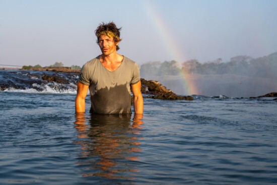 Markoff poses in the Cataract Island Pools at the edge of Zimbabwe’s Victoria Falls wearing Copala by Ben Rose(Credit: Thomas Varley)