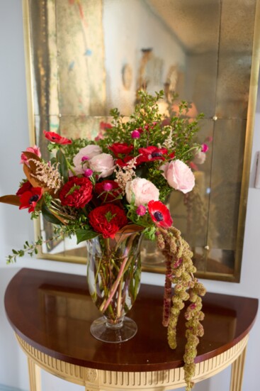 The most festive Christmas garden roses, red with green centers, along with red anemones, plus pink garden roses, pink astilbe and hot pink gomphrena, with red 