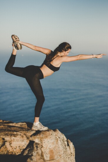 Photo by Tembela Bohle: https://www.pexels.com/photo/woman-wearing-black-bra-and-pants-on-top-of-the-mountain-near-lake-963697/