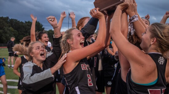 Field hockey players celebrate a past win over Oklahoma City’s Casady School.