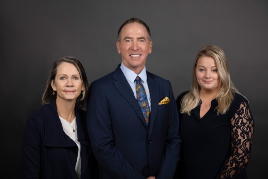 Guy Alan Weinhold, CFP® AAMS® Financial Advisor, along with Suzanne Naccarato, Sr. Branch Office Administrator, and Stormy Burns, Registered Branch Associate