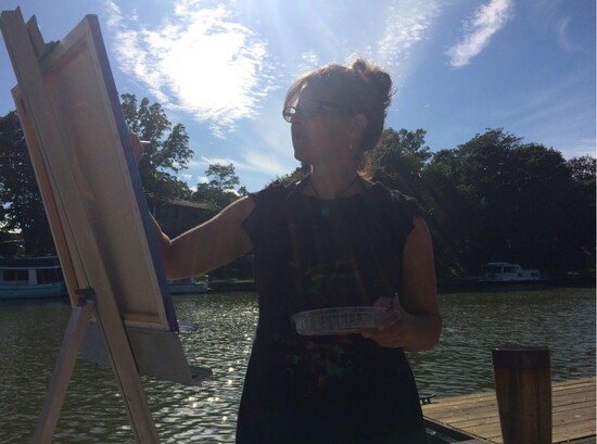 Painting by the water at the Keuka Lake Soulful Art Retreat
